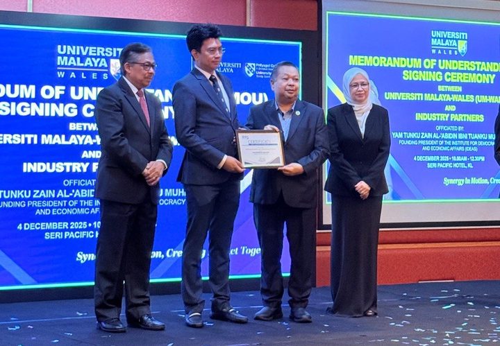 Prof. Is. Dr. Zam @ Ab Razak Zamri receiving his Professor of Practice appointment at UM-Wales